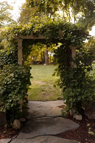 a bathroom with a toilet a sink and a mirror