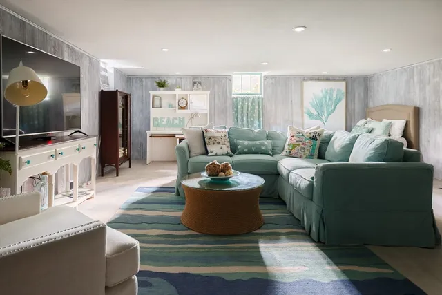 a bedroom with a bed and a fireplace