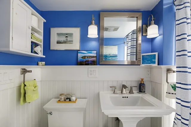 a kitchen with stainless steel appliances granite countertop a sink and a stove