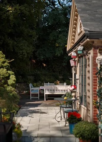 a couch sitting in front of a building