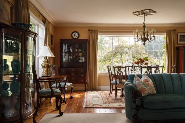 a view of a dining room with furniture window and outside view