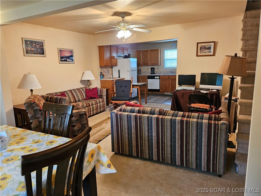22 Launch Landing Edwards, MO 65326 - Photo 19 of 48 Living room, main level, open to kitchen, and dini