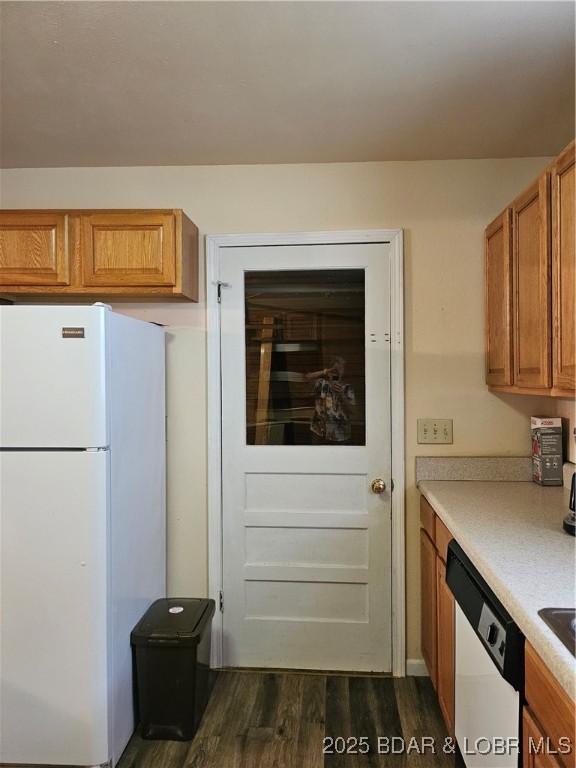 22 Launch Landing Edwards, MO 65326 - Photo 26 of 48 This door in the kitchen leads to a 1o-car attache