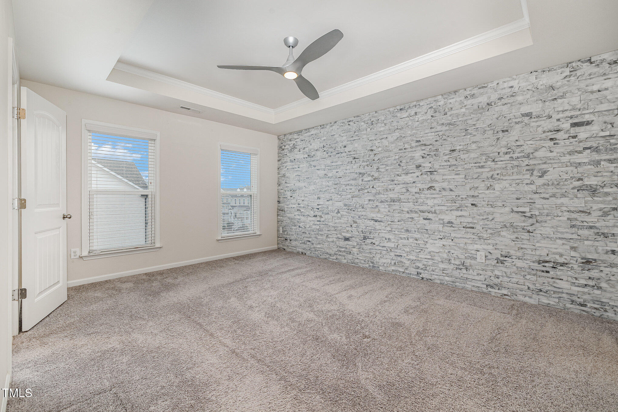 7002 Reedybrook Crossing Apex, NC 27523 - Photo 9 of 27 Primary Bedroom with Feature Wall