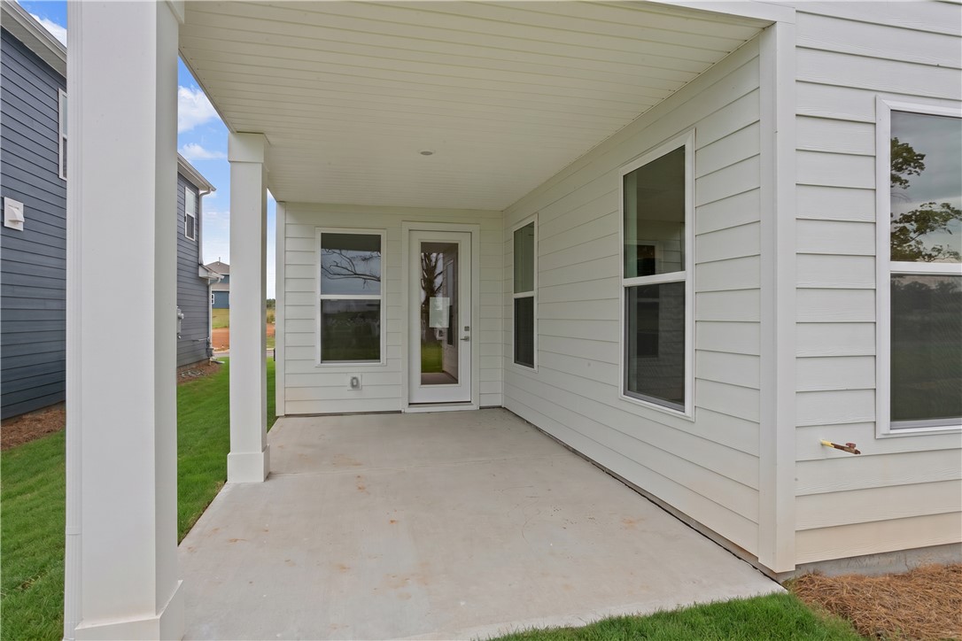 629 Sweetspire Trail, Unit 149 Seneca, SC 29678 - Photo 28 of 30 A spacious covered patio provides a delightful outdoor living extension.