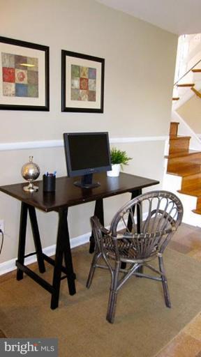 6115 Greentree Road Bethesda, MD 20817 - Photo 13 of 19 a view of a workspace with furniture
