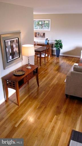 6115 Greentree Road Bethesda, MD 20817 - Photo 5 of 19 a living room with furniture and a wooden floor