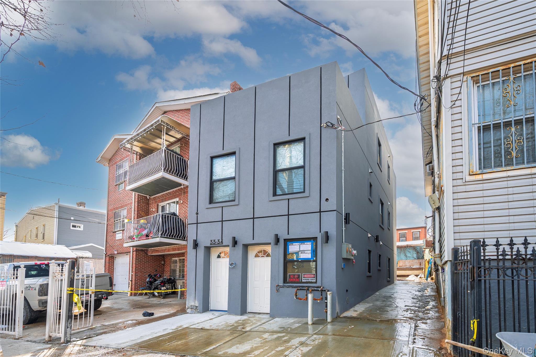 a view of a brick building with many windows