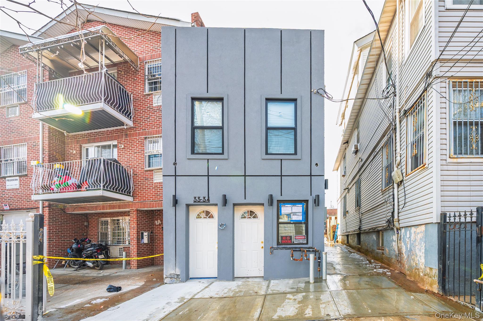 33-34 109th Street Queens, NY 11368 - Photo 2 of 26 a view of a brick building with many windows