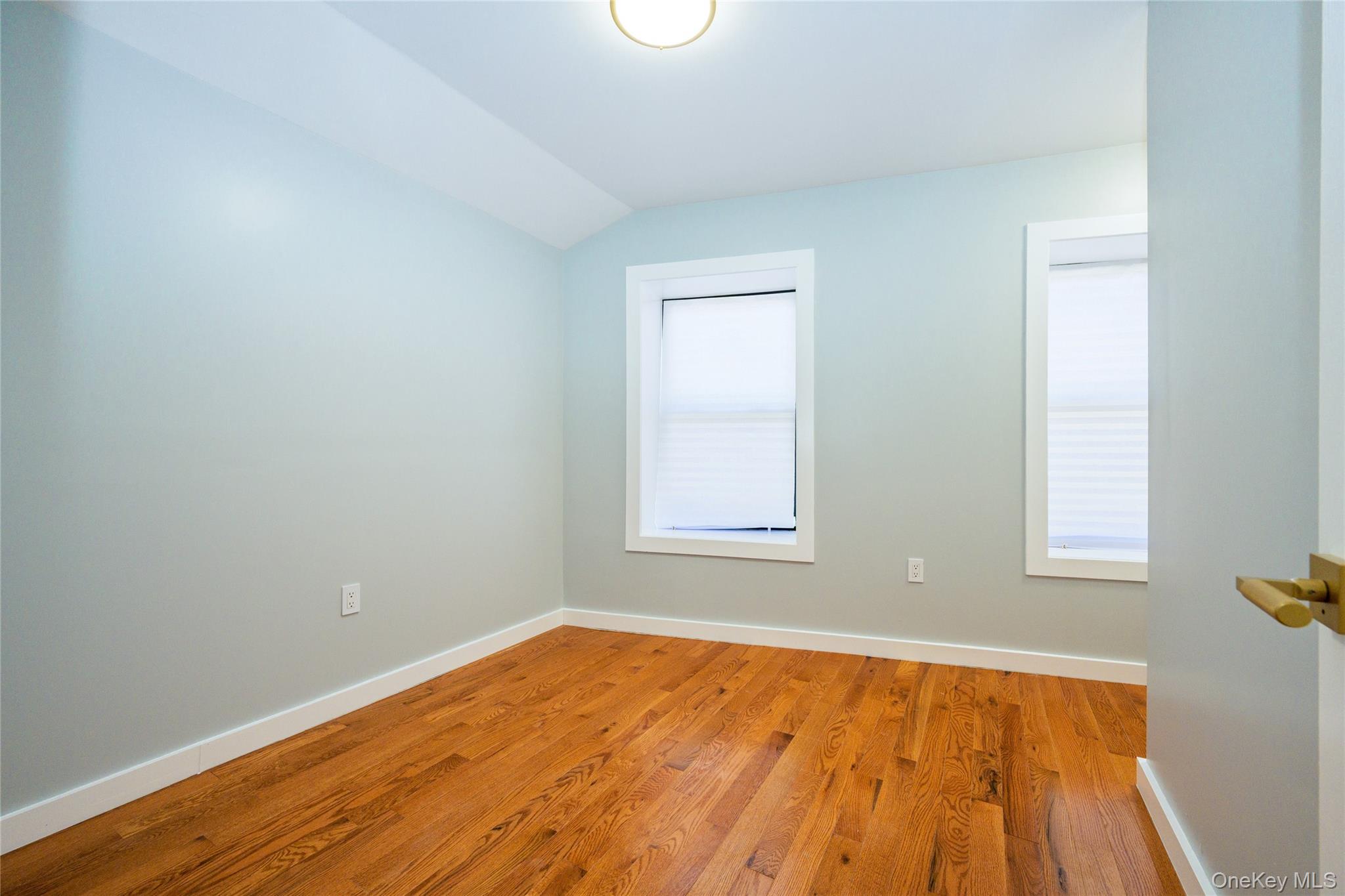 33-34 109th Street Queens, NY 11368 - Photo 23 of 26 an empty room with a window