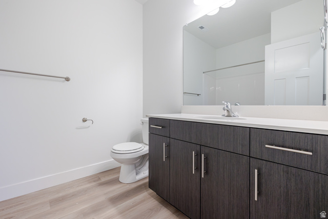 4661 Poplar Way, Unit R303 Mapleton, UT 84664 - Photo 6 of 17 Bathroom with vanity and light wood-style floors