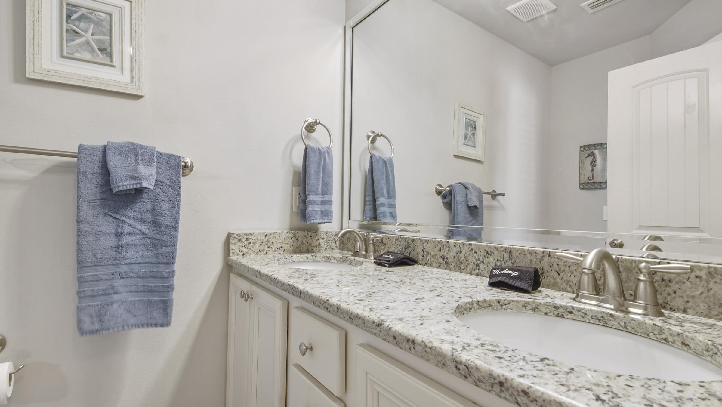 30 Grayling Way Inlet Beach, FL 32461 - Photo 16 of 26 a bathroom with a granite countertop sink and a mirror
