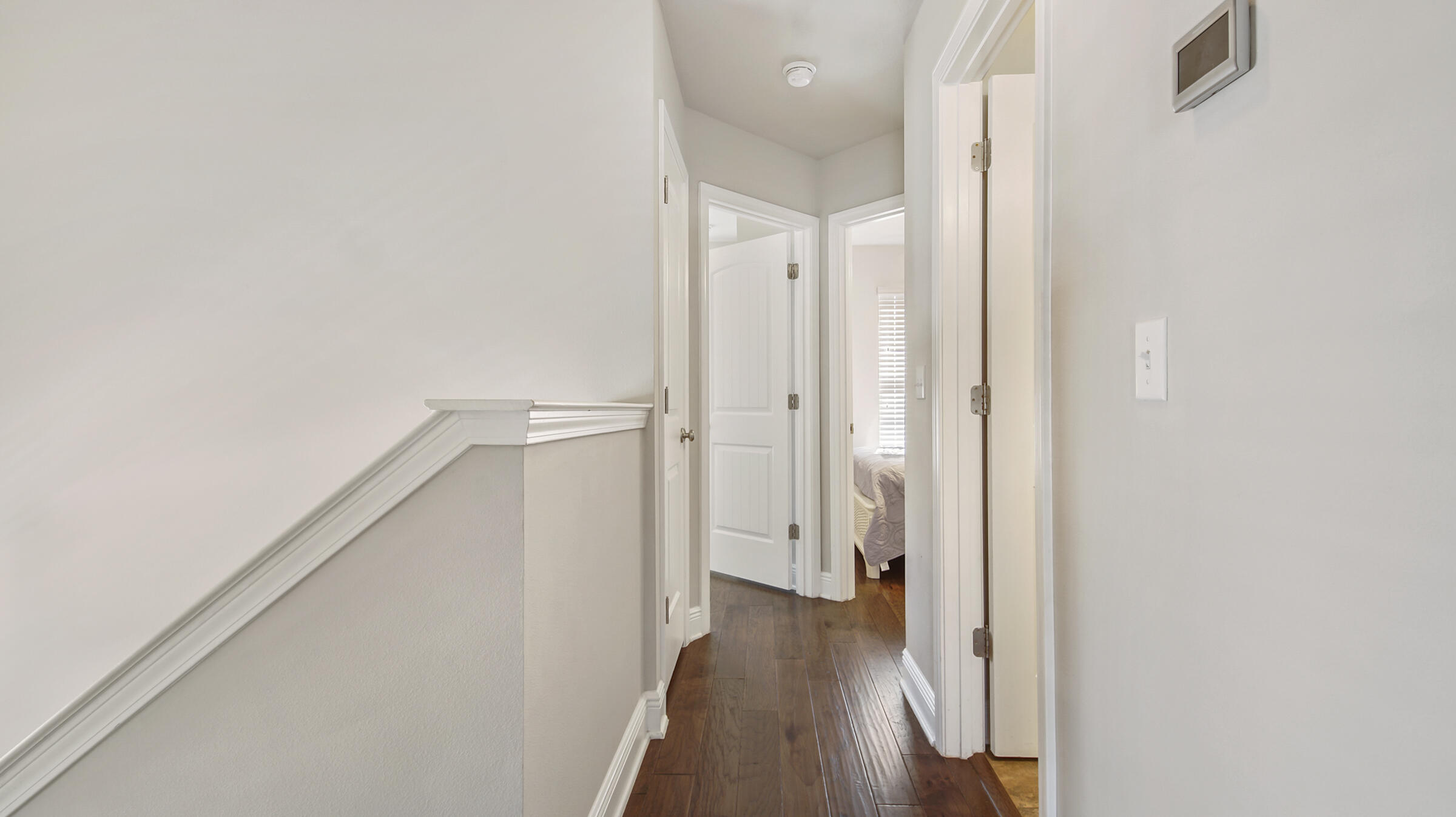 30 Grayling Way Inlet Beach, FL 32461 - Photo 17 of 26 a view of a hallway with wooden floor