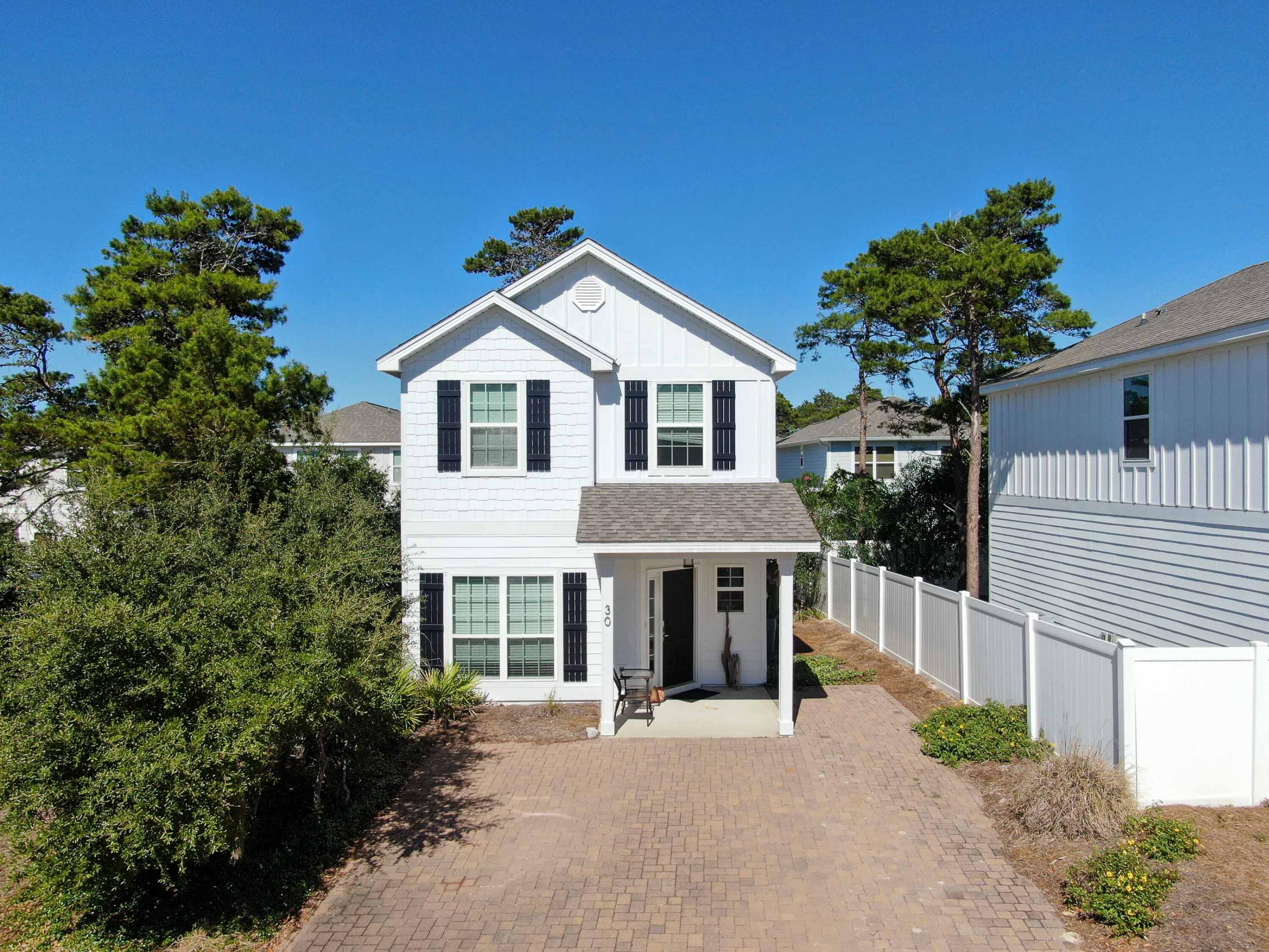30 Grayling Way Inlet Beach, FL 32461 - Photo 25 of 26 a front view of a house with plants