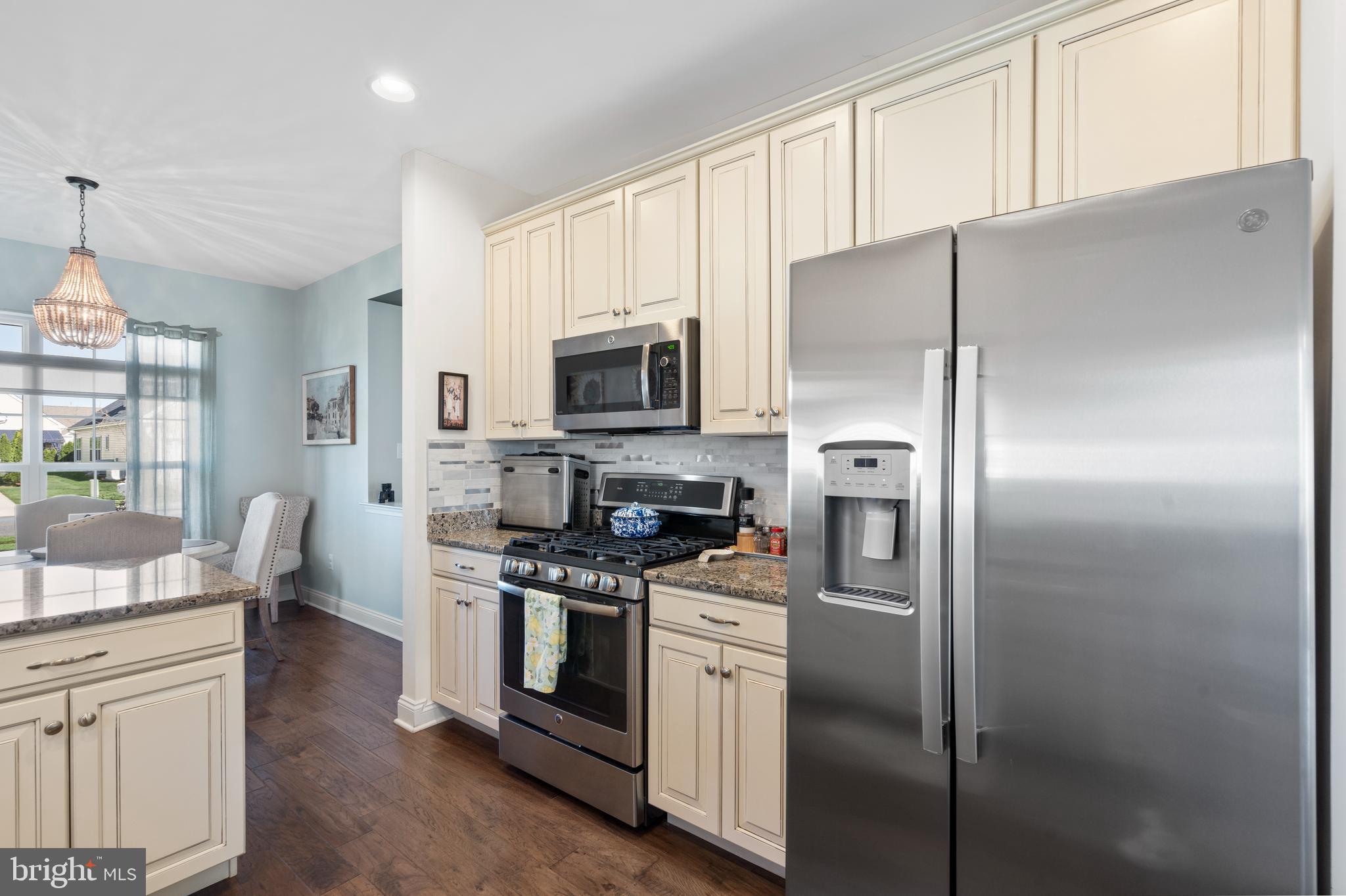 118 Field Loop Glassboro, NJ 08028 - Photo 11 of 51 a kitchen with stainless steel appliances a refrigerator sink and microwave