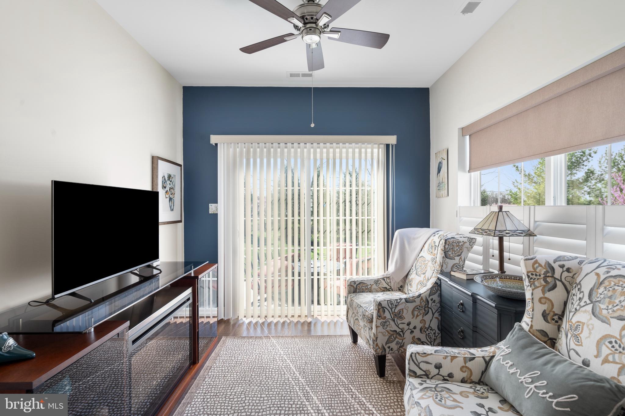 118 Field Loop Glassboro, NJ 08028 - Photo 16 of 51 a living room with furniture and a flat screen tv