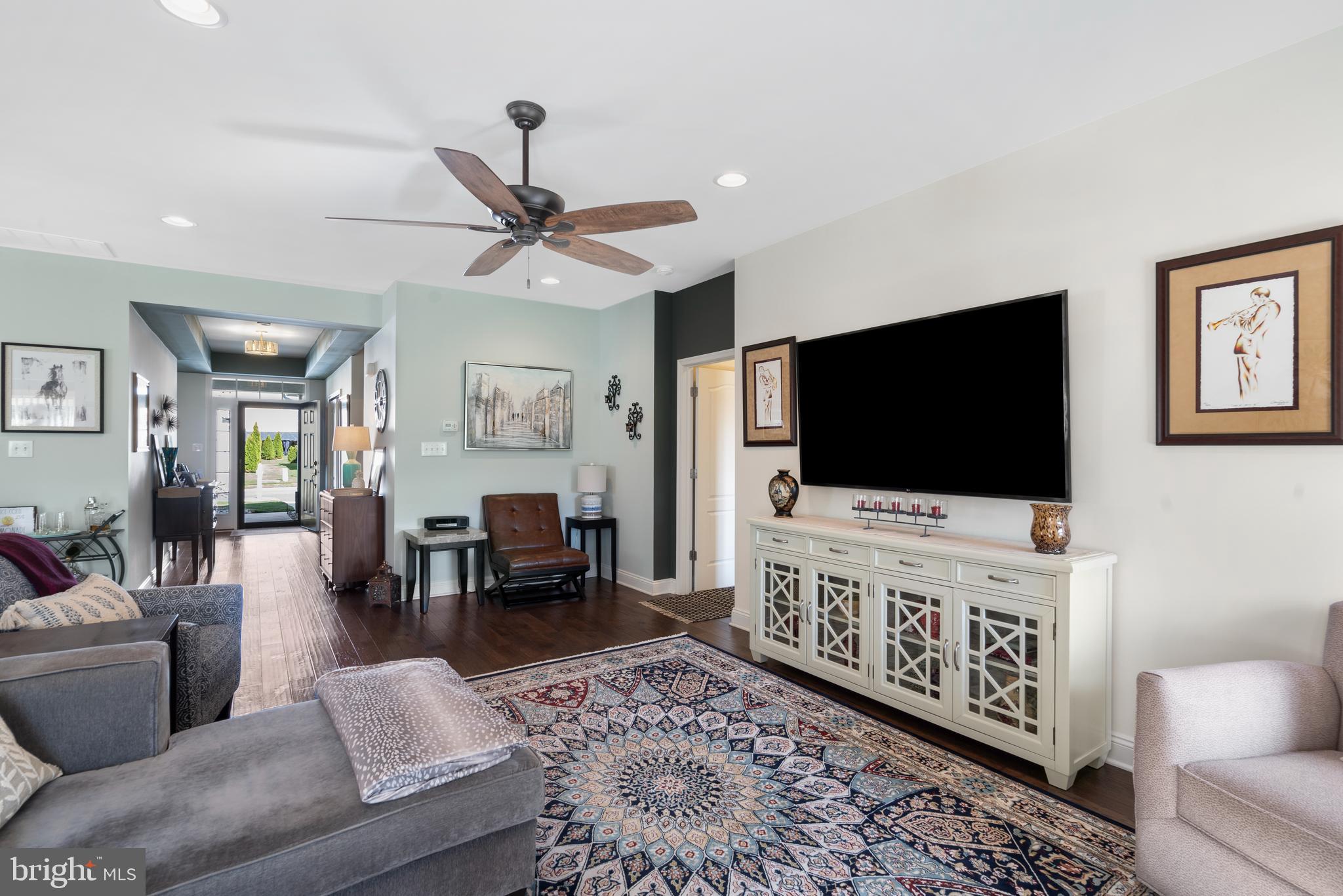118 Field Loop Glassboro, NJ 08028 - Photo 19 of 51 a living room with furniture and a flat screen tv