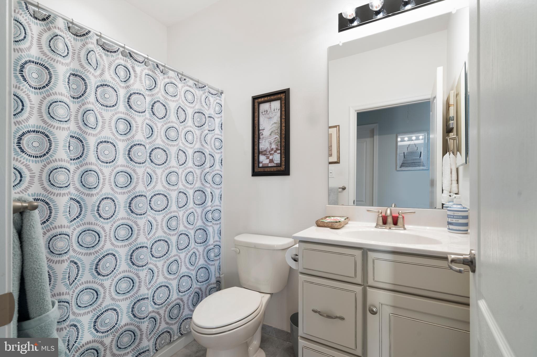 118 Field Loop Glassboro, NJ 08028 - Photo 25 of 51 a bathroom with a sink mirror vanity and toilet