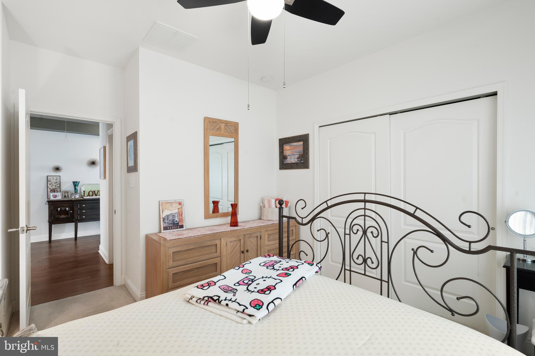 118 Field Loop Glassboro, NJ 08028 - Photo 27 of 51 a bedroom with a bed and a table in it