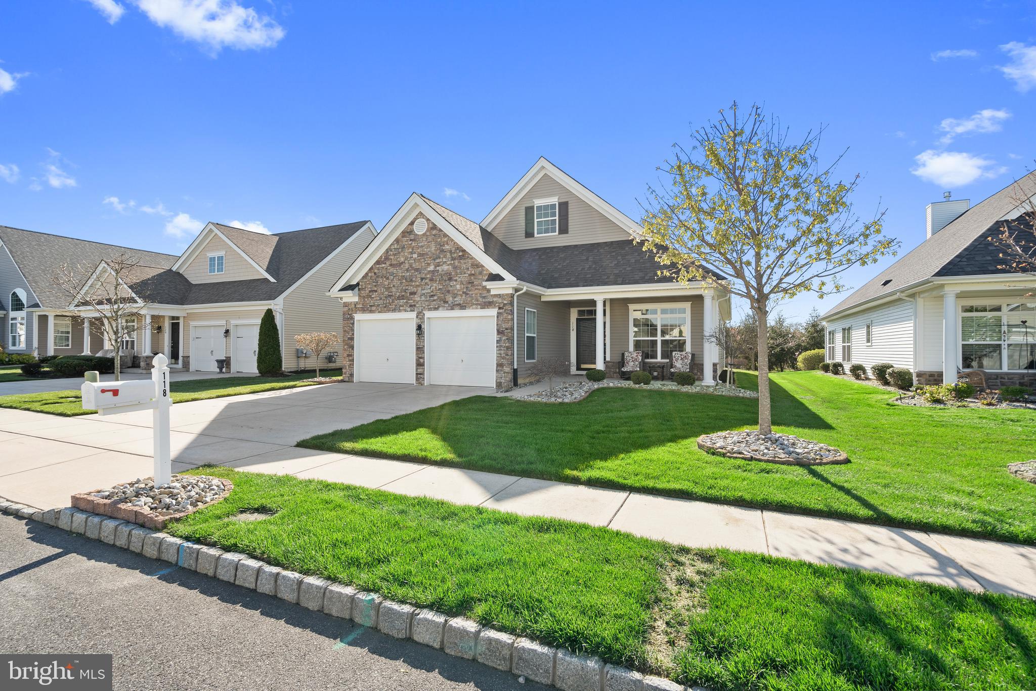118 Field Loop Glassboro, NJ 08028 - Photo 3 of 51 a front view of a house with a yard and garage