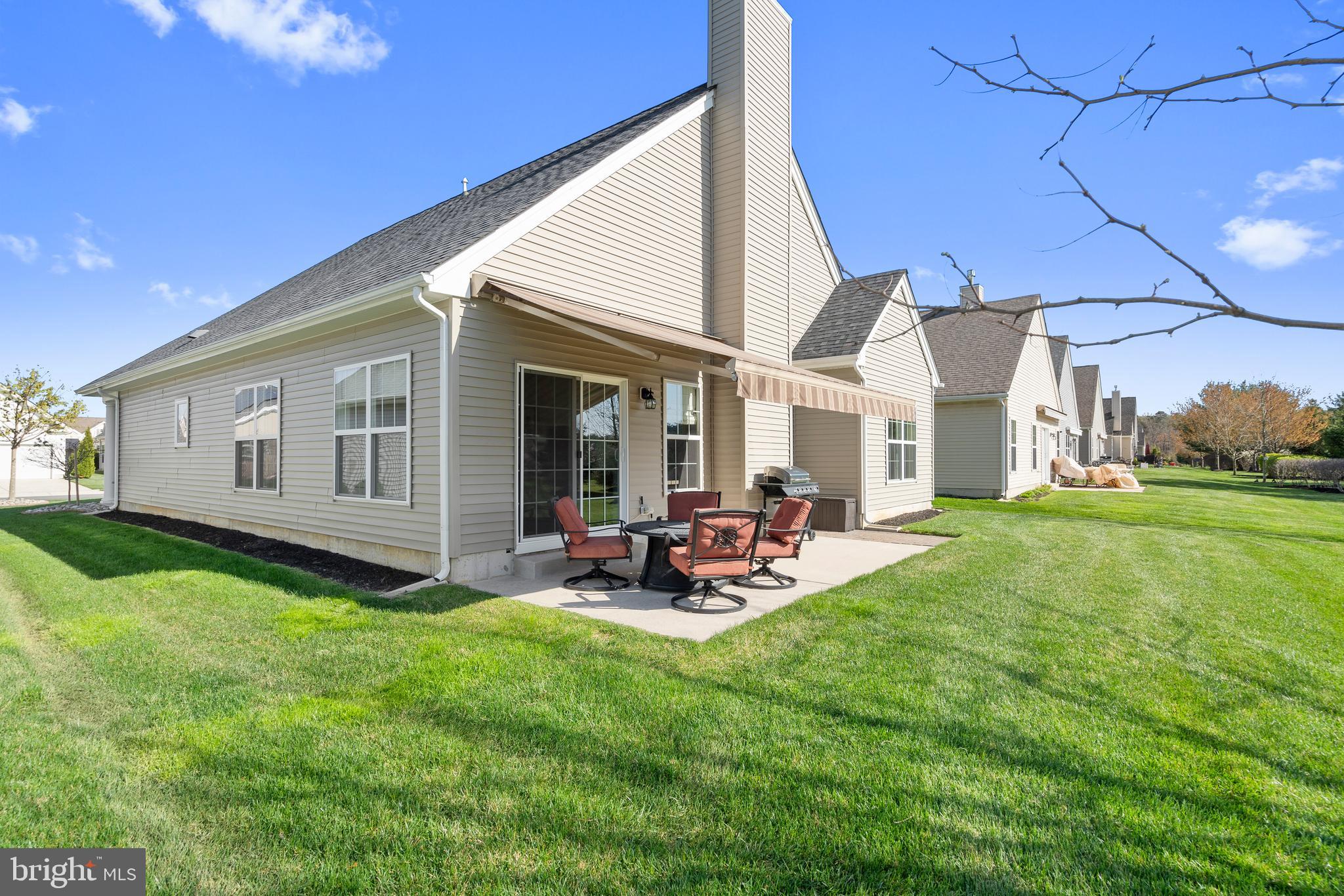 118 Field Loop Glassboro, NJ 08028 - Photo 31 of 51 a view of a house with backyard sitting area and garden