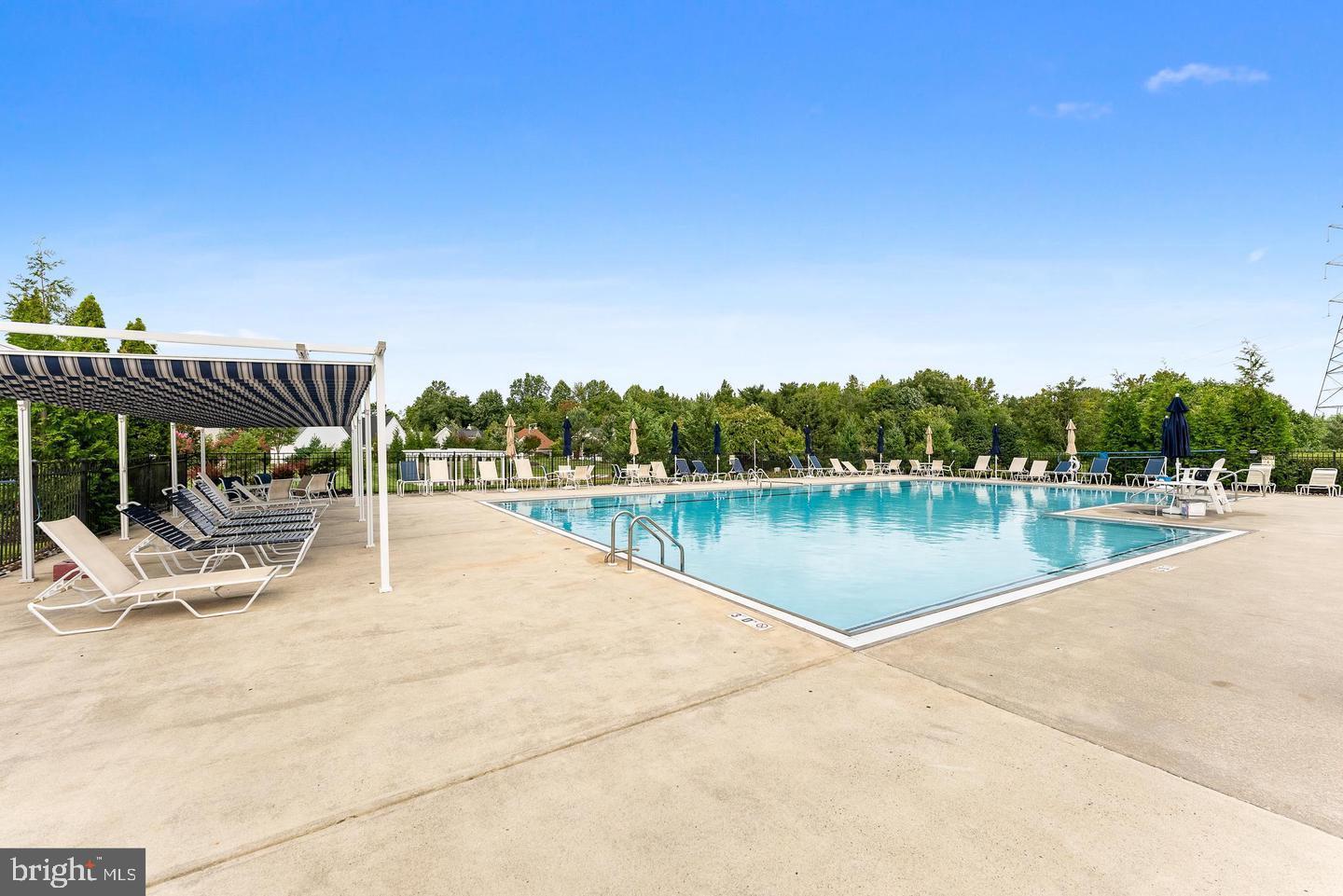 118 Field Loop Glassboro, NJ 08028 - Photo 42 of 51 a view of a lake with sitting area