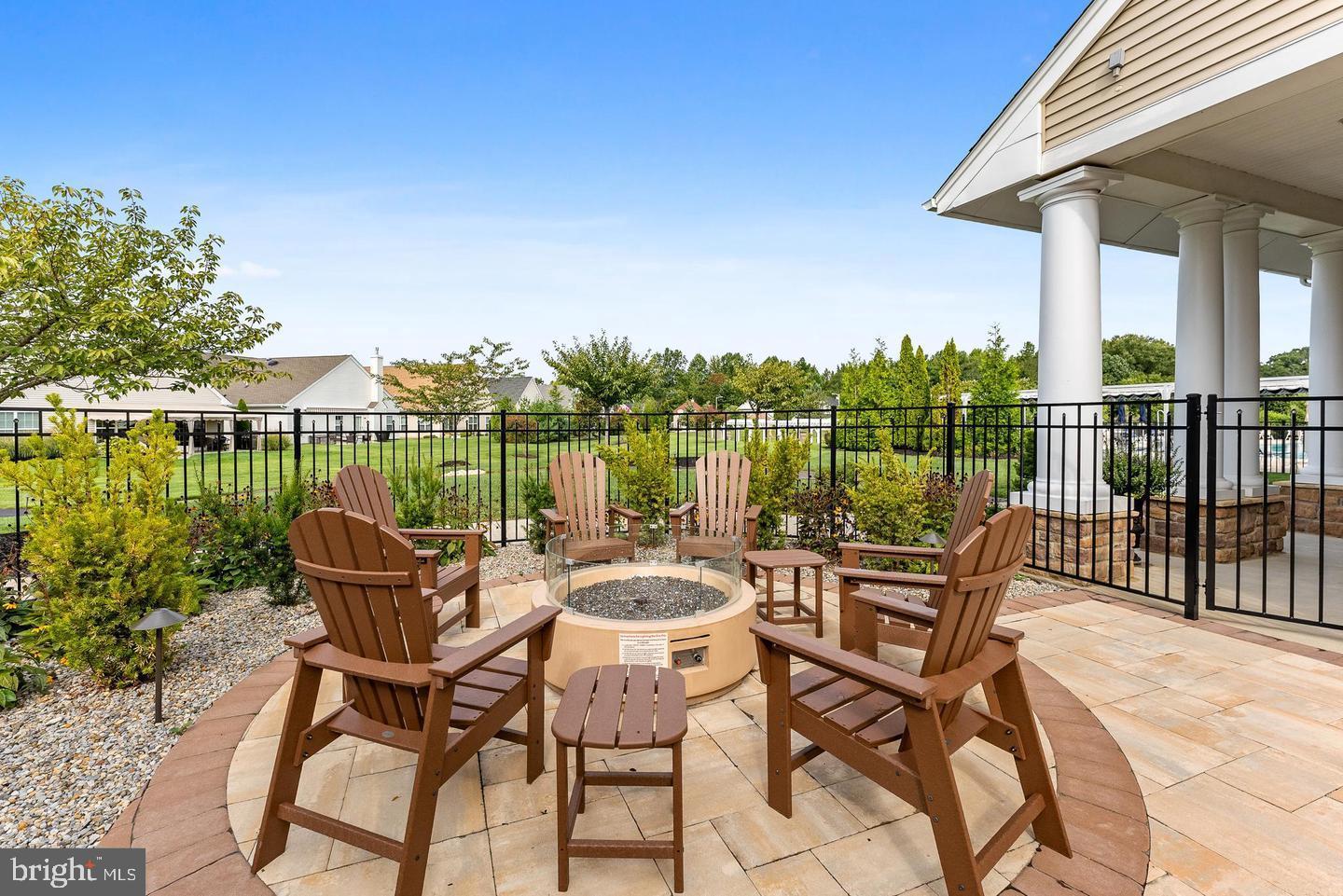 118 Field Loop Glassboro, NJ 08028 - Photo 43 of 51 a patio with yard glass top table and chairs