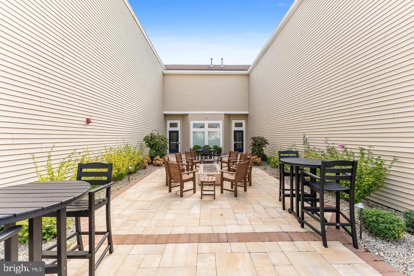 118 Field Loop Glassboro, NJ 08028 - Photo 44 of 51 a dining space with furniture and outdoor view