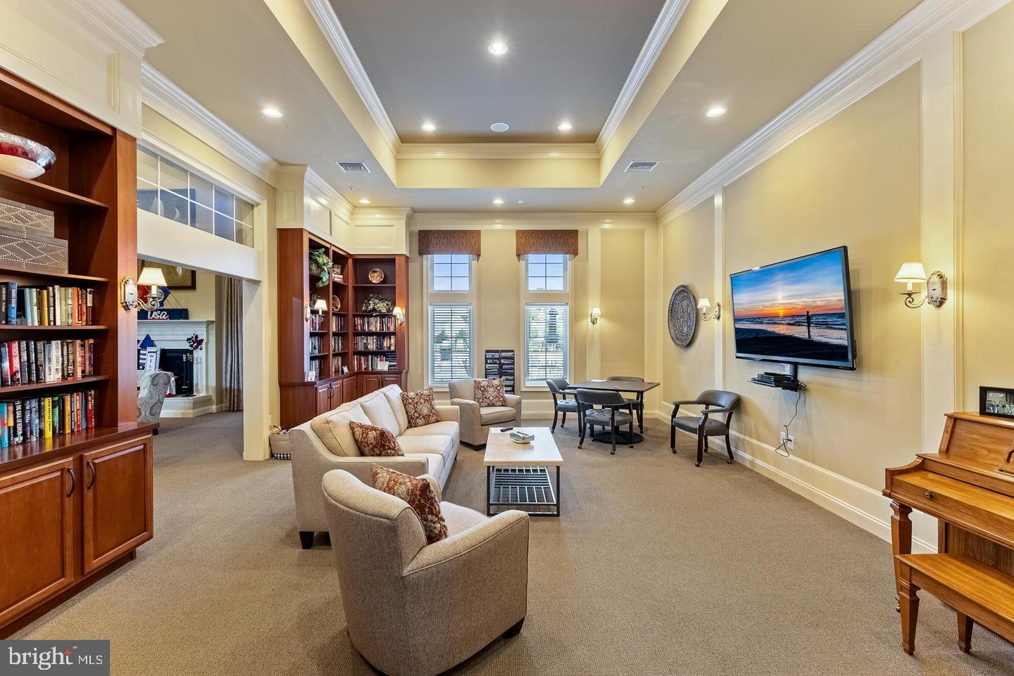 118 Field Loop Glassboro, NJ 08028 - Photo 49 of 51 a living room with furniture and a flat screen tv