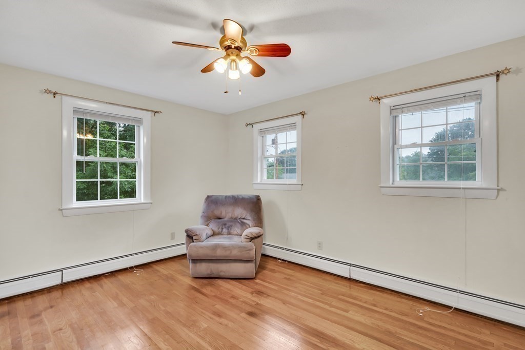 184 West Acton Road Stow, MA 01775 - Photo 14 of 35 a living room with furniture and a window