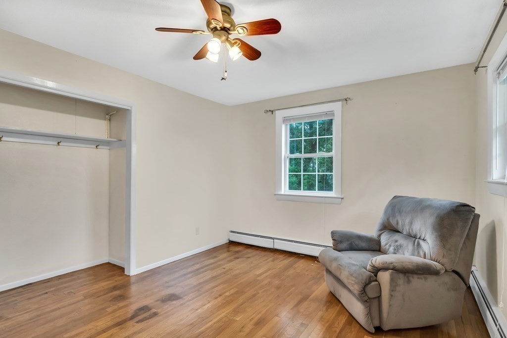 184 West Acton Road Stow, MA 01775 - Photo 16 of 35 a living room with furniture and a window