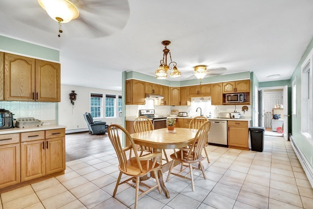 184 West Acton Road Stow, MA 01775 - Photo 22 of 35 a view of a dining room kitchen and a window