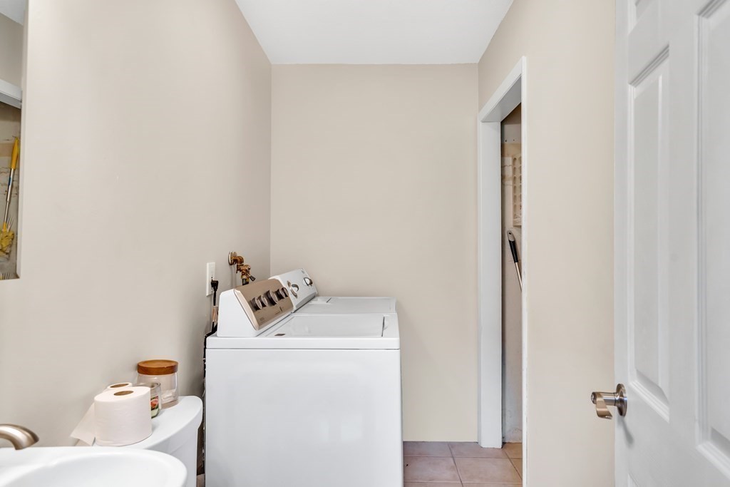 184 West Acton Road Stow, MA 01775 - Photo 26 of 35 a utility room with dryer and washer