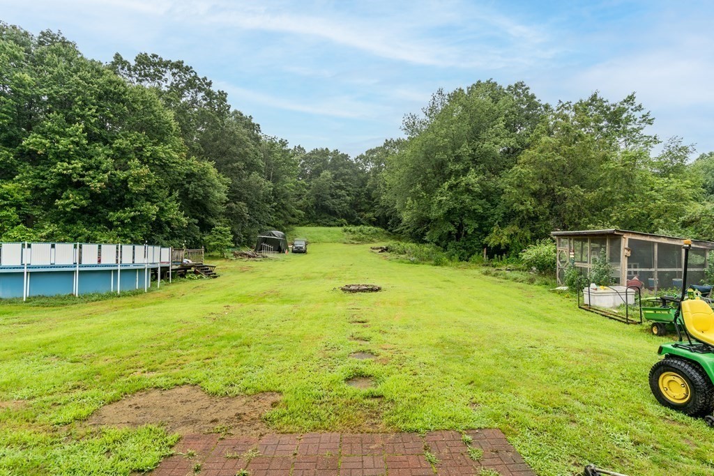 184 West Acton Road Stow, MA 01775 - Photo 32 of 35 a view of a backyard with swimming pool