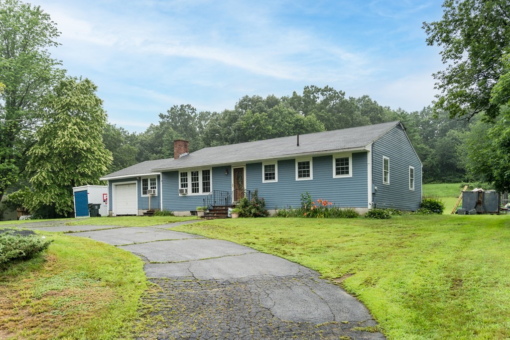 184 West Acton Road Stow, MA 01775 - Photo 34 of 35 a front view of a house with a yard