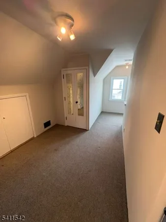 a view of empty room with windows