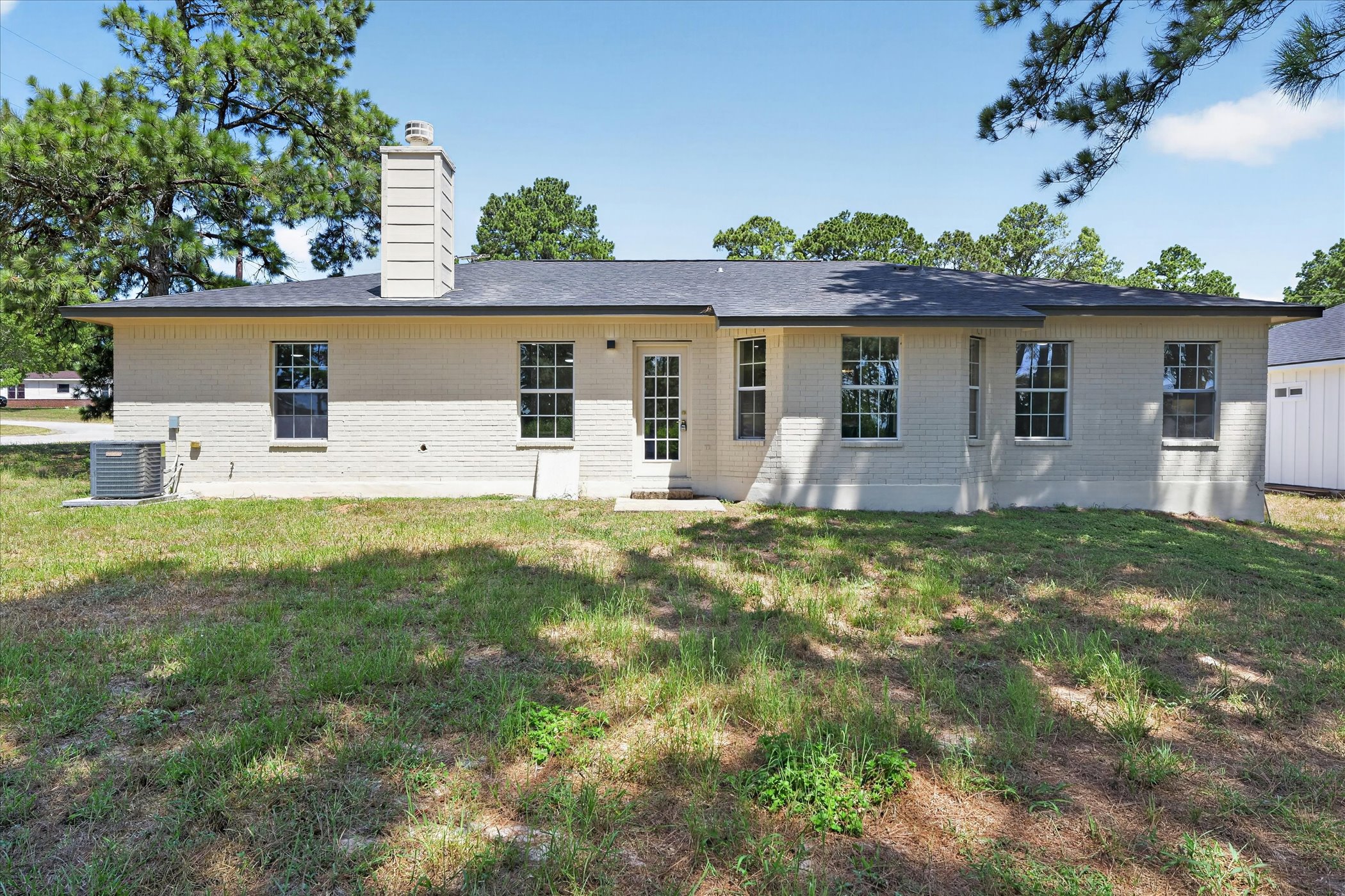 258 Pine View Loop Bastrop, TX 78602 - Photo 39 of 40 A classic brick exterior offers timeless appeal and durable construction.