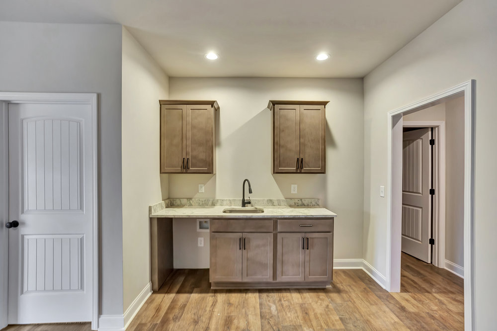118 Bonaire Point Anderson, SC 29621 - Photo 20 of 23 This versatile area features a practical wet bar, ideal for various household needs.