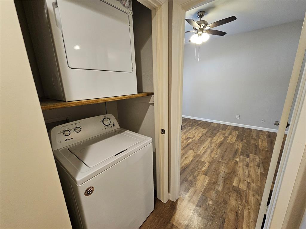 8601 Park Lane, Unit 522 Dallas, TX 75231 - Photo 11 of 21 a view of bathroom with a washer and dryer