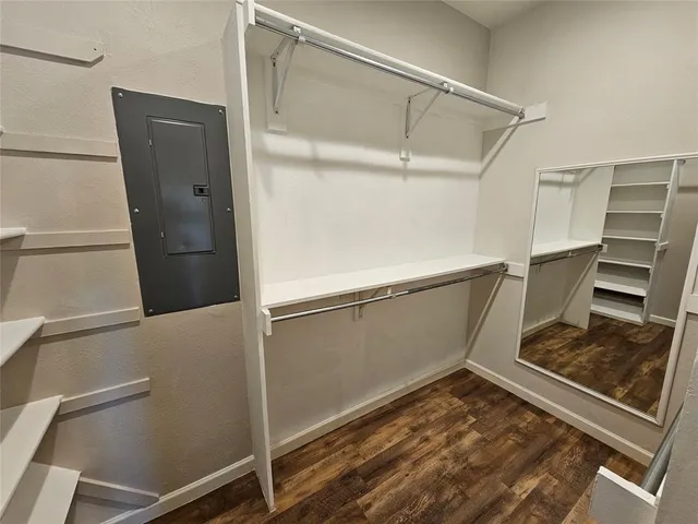 a view of an empty walk in closet