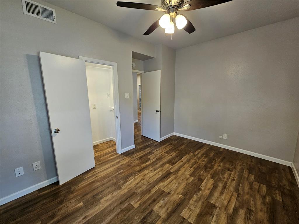 8601 Park Lane, Unit 522 Dallas, TX 75231 - Photo 10 of 21 a view of empty room with wooden floor