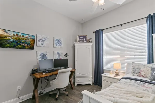 a workspace with furniture and window