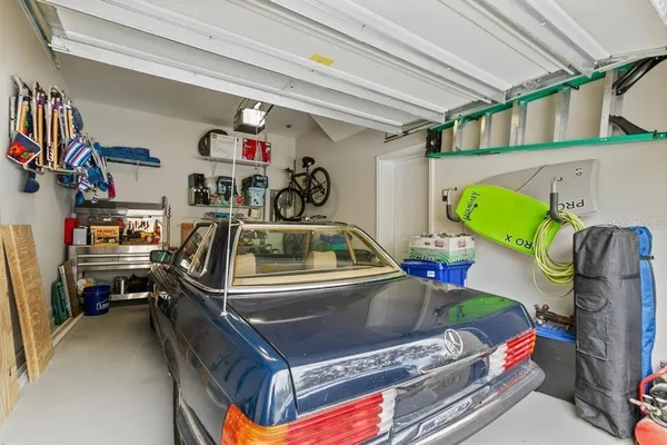 a front view of a house with outdoor seating