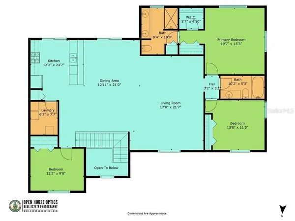 a kitchen with kitchen island a sink and chandelier