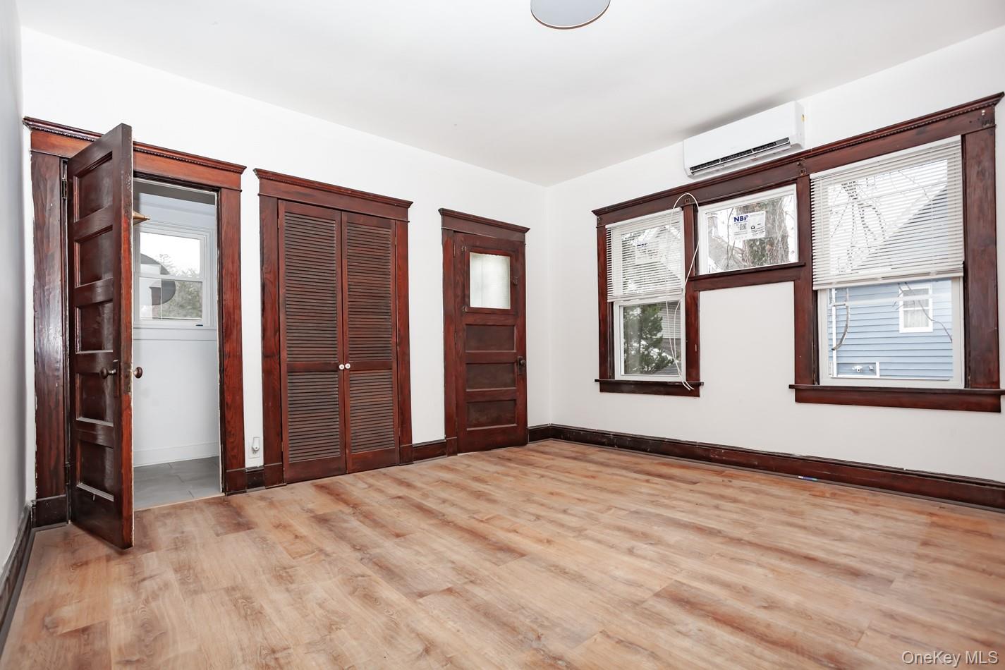 1009 Hudson Avenue, Unit 1S Peekskill, NY 10566 - Photo 11 of 21 a view of an empty room with glass door and balcony