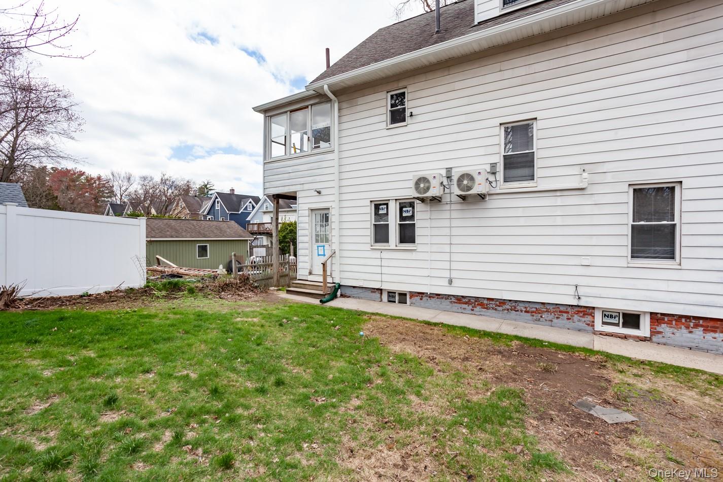 1009 Hudson Avenue, Unit 1S Peekskill, NY 10566 - Photo 3 of 21 a view of a house with backyard and sitting area