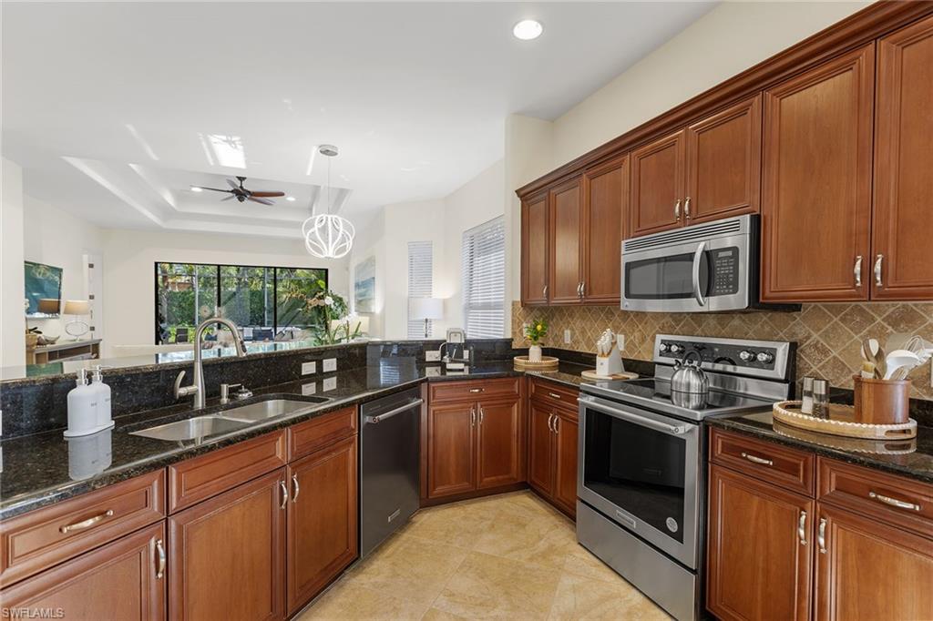 7393 Moorgate Point Way Naples, FL 34113 - Photo 7 of 49