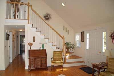 8 Dundee Circle Harwich, MA 02645 - Photo 11 of 28 a view of entryway and hall with wooden floor