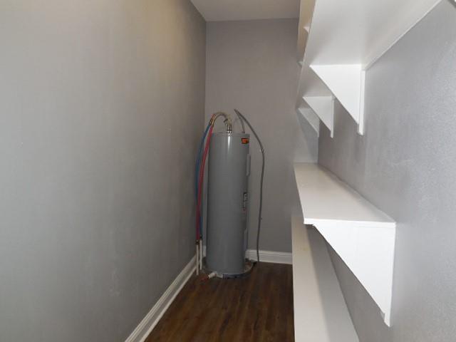127 Stonewall-Preston Road Stonewall, LA 71078 - Photo 16 of 19 Utility room featuring electric water heater