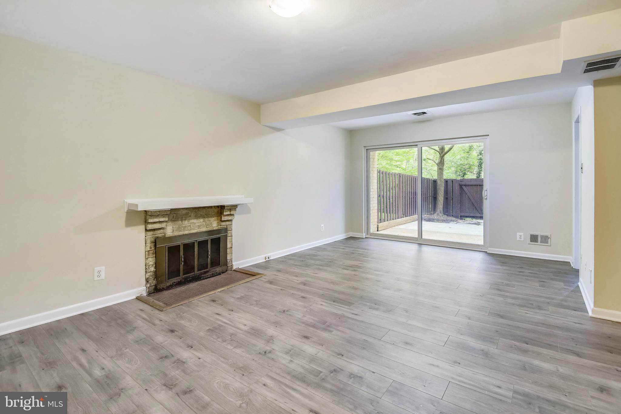 11077 Saffold Way Reston, VA 20190 - Photo 22 of 30 Recreation Room with Wood Fireplace